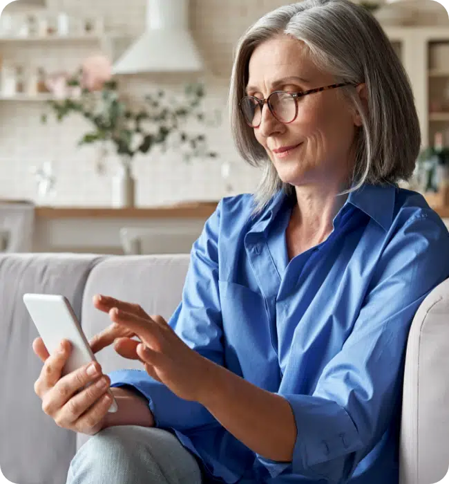 First-party-cookie-solution-woman-looking-at-phone